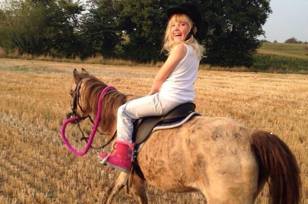 Daisy: young girl on a pony