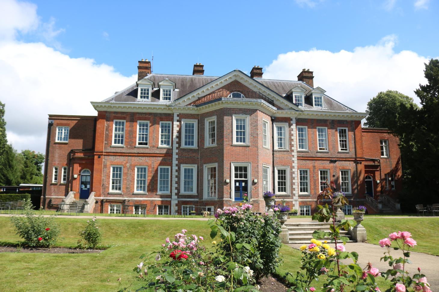 Tadworth Court mansion in the summer