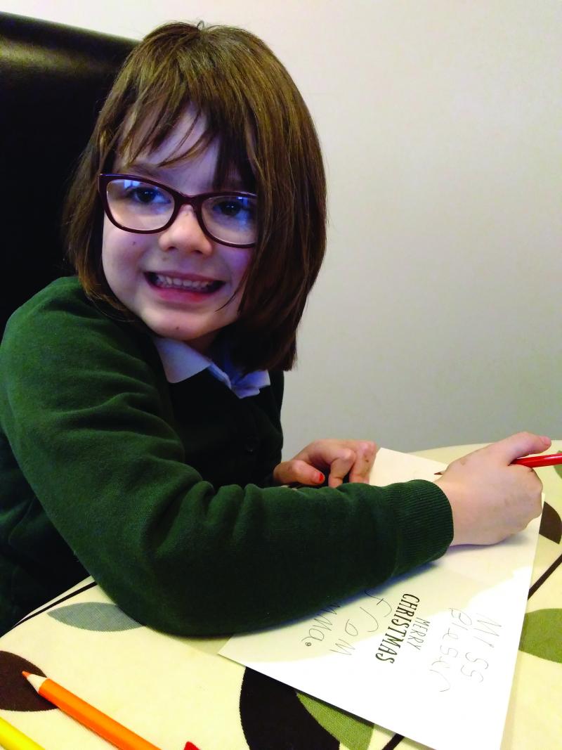 Emma in her school uniform