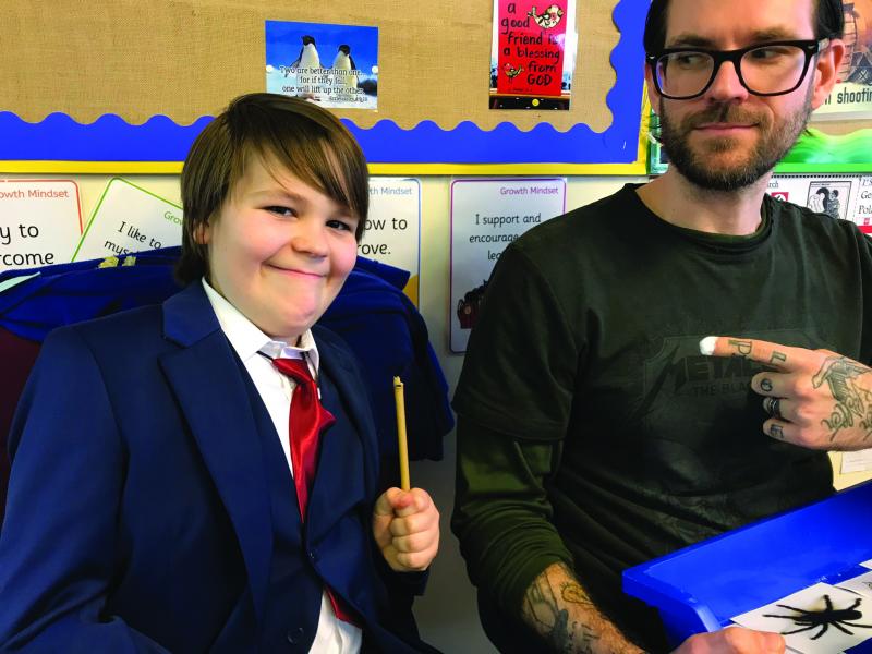 Joey and his dad on a school visit
