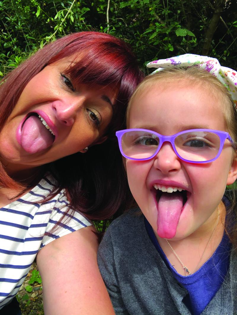 Mollie and her mum at home