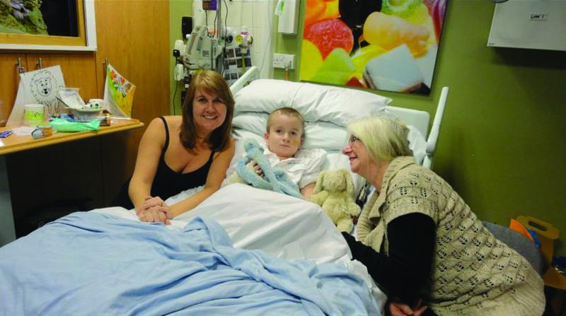 Paul in hospital with family